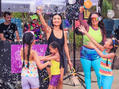 Mom and daughters with bubbles