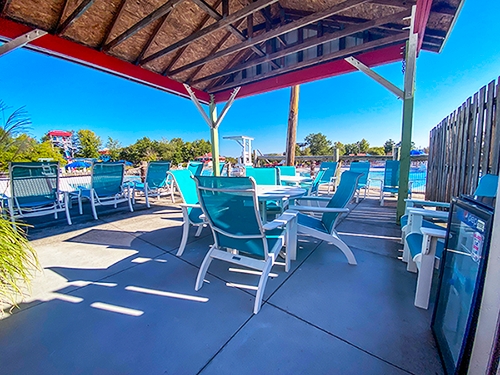 Pointe Party cabana with chairs and a table