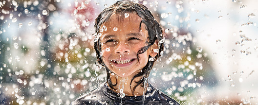 Boy playing in water